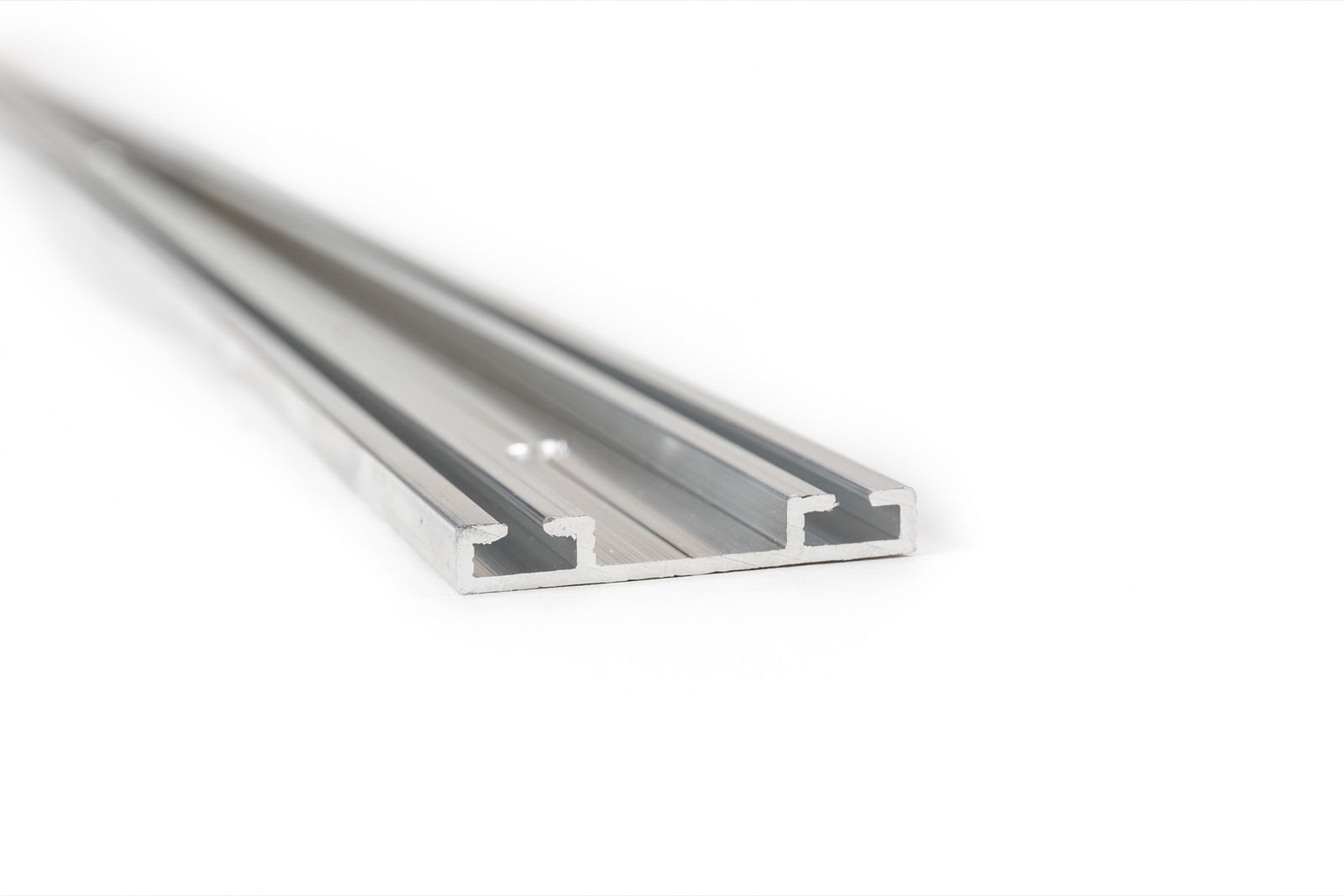 Close-up on the T-slotted garage door bottom seal retainer